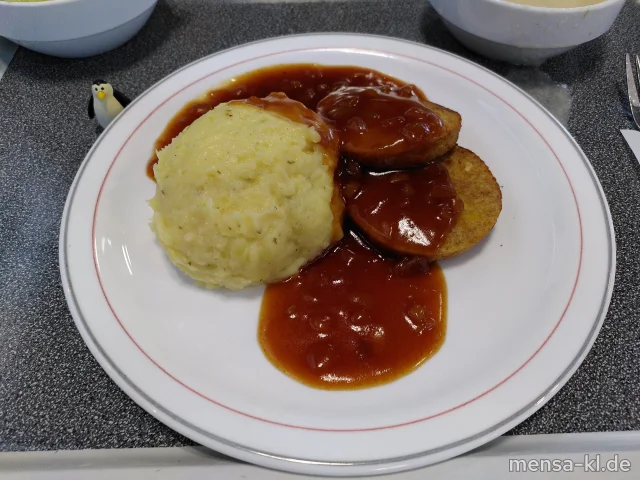 Karotten-Hafer-Frikadelle (Gl) mit Pfeffersoße, Kartoffelstampf (5,La,Sw) und Salat