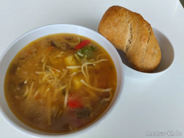 Ramen: Japanische Nudelsuppe mit Wok-Gemüse, Zuckerschoten, Maiskölbchen und Tofu (2,Gl,Se,So), dazu ein Sauerteigbrötchen (Gl)