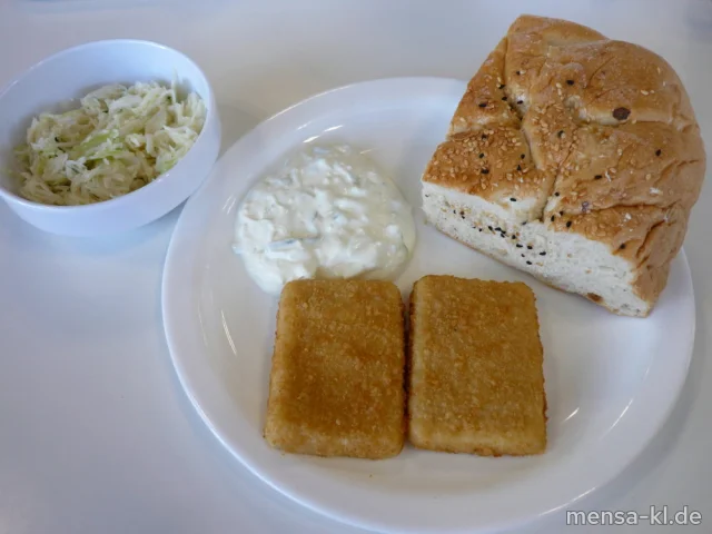 Gebackener griechischer Hirtenkäse (Gl,La,V) mit Tzatziki (9,Gl,Ei,La,So,V) im Fladenbrot (Gl,Se,V) und Krautsalat (1,5,9,Gl,Ei,Sw,So,V)