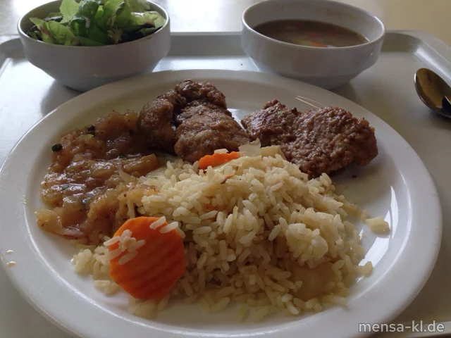 Zwei Schweinelende-Medaillons (S,Lfrei) mit Ananas-Pfeffer-Zwiebel-Chutney (Lfrei), buntem Reis (Lfrei) und Salat (Lfrei)
