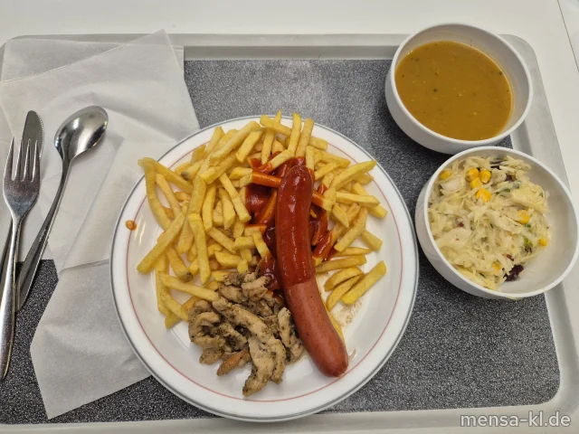 Pfannengyros vom Hähnchen (G) und Currywurst (1,2,3,8,9,Gl,Sf,R,L), dazu Tzatziki (Gl,Nu,Sf), Pommes frites und Krautsalat (1,5,Sw)