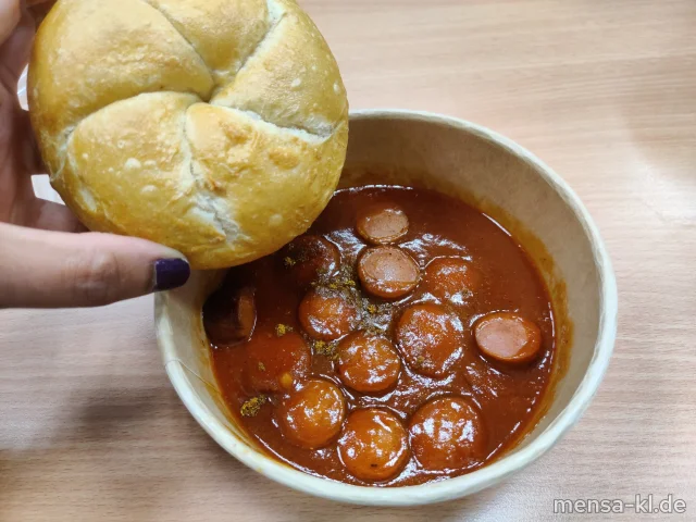 Rindswurst (1,2,3,8,9,Sf,R) mit Currysoße (Sl,Sf), dazu ein Kaiserbrötchen (Gl)