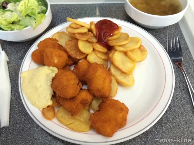 Hähnchencrossies (Gl,G) mit Curry-Dip (4,9,Gl,Ei,La,Sf,So), Pommes-Chips und Salat