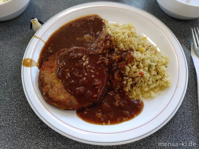 Sunny Burger (Gl,Sf) mit Zwiebel-Granatapfelsoße (1), Couscous (Gl,Sl) und Salat
