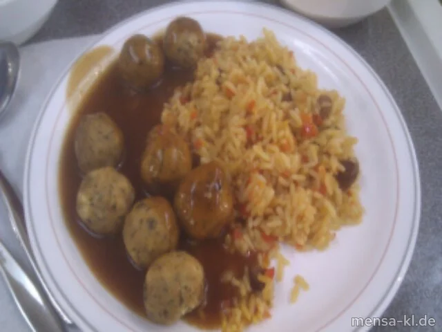 Falafel-Kichererbsen-Bällchen (Gl,Sl) (Fleischlose Altenative mit "Ras el Hanout"-Soße (3,Gl,Sl) mit "Ras el Hanout"-Soße (3,Gl,Sl,G), orientalischem Reis (Nu,Sl) und Salat (1,3,5,Sw)