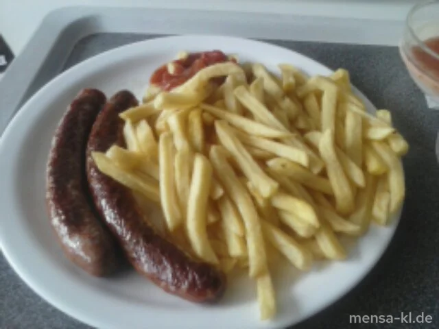 Zwei Merguez (französische Wurstspezialität) (1,2,3,4,R,L), Harissa-Dip und Pommes-Frites