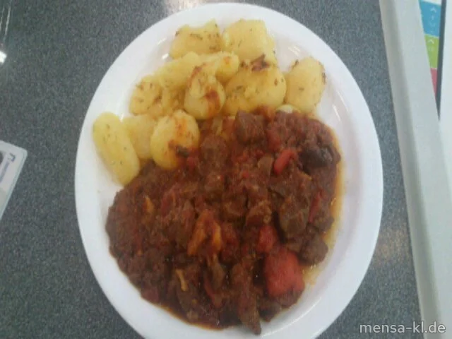 Lammragout "Provencial" mit Tomaten-Knoblauch-Thymian-Sugo (5,9,Sw,Sf,A,L), Rosmarinkartoffeln (La)