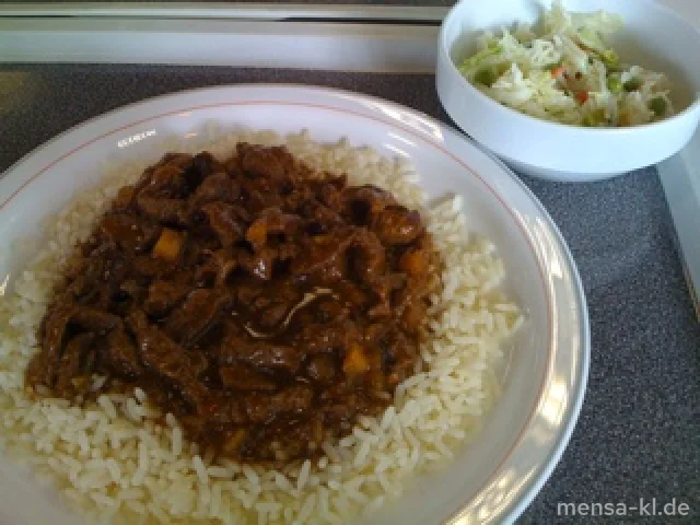 Rindfleischstreifen mit Cranberries und Äpfeln, Reis und Chakalaka-Salat