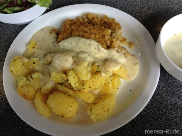 Seelachsfilet 'Bordelaise' mit Kräuterauflage (F), Dijonsenfsoße, Petersilienkartoffeln und Salat