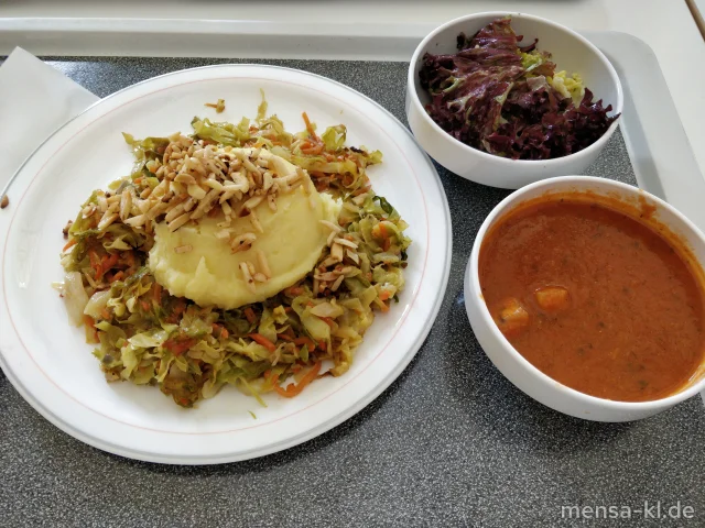 Ofen Spitzkohl mit Senfsoße (Sf), Kartoffelpüree (5,Gl,Sw,So) und Mandelcrunch (Nu), dazu Salat