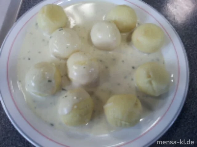 Gnocchi Grande mit Frischkäse-Kräuter-Füllung (Gl,Ei,La,V), Basilikumsoße (1,Gl,La,V) und Salat (V)