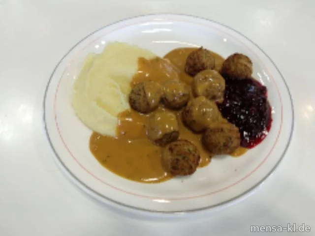 Gemüse-Köttbullar (Ei,V) mit Rahmsoße (Gl,La,V), Kartoffelpüree (La,V), Preiselbeeren (V) und Gurkensalat (1,3,5,Ei,La,Sw,Sf,V)