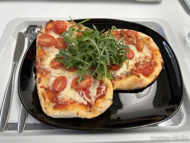 Pinsa mit Rucola, Tomaten und Mozzarella (Gl,La,So)