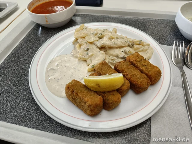 Gemüsekroketten (Gl,Sl,V) mit Remouladen-Dip (1,9,Gl,Ei,La,Sf,V), Kartoffelsalat (1,5,9,Gl,Ei,La,Sw,Sf,V), Zitrone (V) und Salat (V)