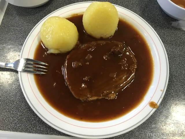 Rinderbraten (3,4,Sl,Sf,R) mit Burgundersoße (5,Gl,Sw,Sf,A) und Kartoffelknödel (5,Sw), dazu hausgemachtes Apfelrotkraut (1,3,5,Sw,A)